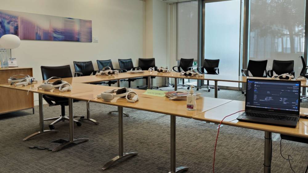 Participants engaging with the WhimsyLabs kidney dissection at Barclays Headquarters